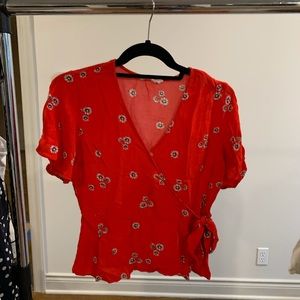 Red floral wrap top